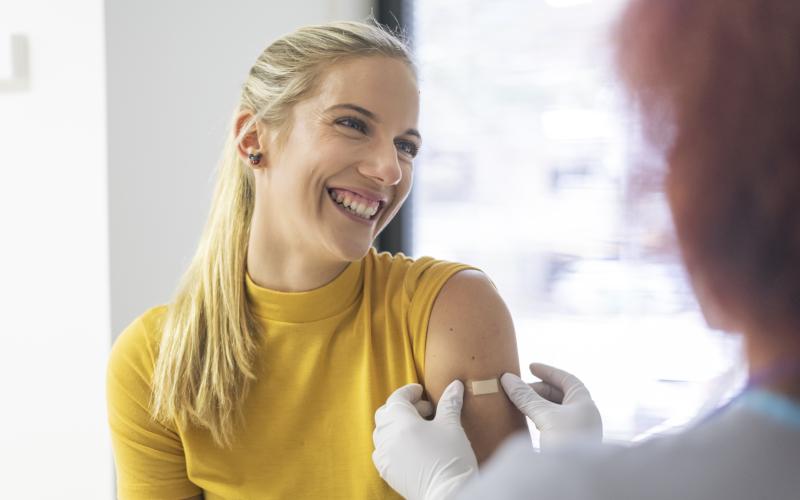 woman getting vaccine