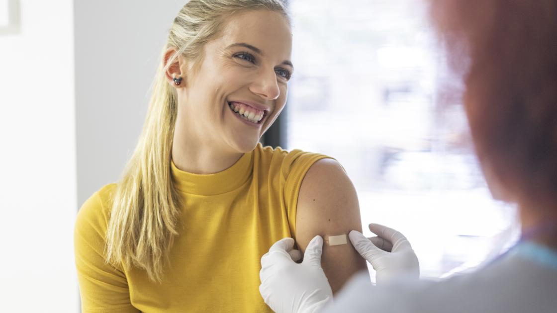 woman getting vaccine