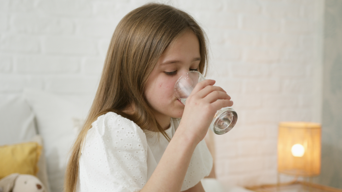 child drinking water